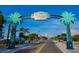 West Dearborn Street entrance in Englewood with its lovely palm tree decorated gateway at 1921 Fairview Dr, Englewood, FL 34223