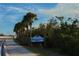 Welcome to Manasota Key street view on a sunny day at 1921 Fairview Dr, Englewood, FL 34223