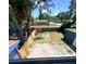 Fenced backyard, brick pavers, and partial shed at 1947 Los Lomas Dr, Clearwater, FL 33763