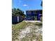 The large backyard features a shed and patio area at 1947 Los Lomas Dr, Clearwater, FL 33763