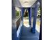 Covered porch with painted archways at 1947 Los Lomas Dr, Clearwater, FL 33763