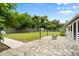 Spacious backyard with lush green grass and plenty of room for outdoor activities at 2015 Bayshore Gardens Pkwy, Bradenton, FL 34207