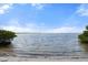 Tranquil bay view from the community's beach access, offering serene waterfront scenery and relaxation at 2015 Bayshore Gardens Pkwy, Bradenton, FL 34207