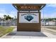 Entrance sign to Bayshore Gardens Marina including web address and phone number for the dockmaster at 2015 Bayshore Gardens Pkwy, Bradenton, FL 34207