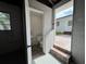 A look inside shows this bathroom has a sink, toilet, and a doorway leading to the backyard at 2333 22Nd S St, St Petersburg, FL 33712