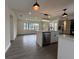 Open floor plan featuring durable floors, a bright kitchen, and stainless appliances at 2333 22Nd S St, St Petersburg, FL 33712