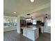 Bright, remodeled kitchen featuring an island, stainless steel appliances, and sleek countertops at 2333 22Nd S St, St Petersburg, FL 33712