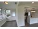 Bright kitchen with island, stainless appliances, black hardware, and modern backsplash at 2333 22Nd S St, St Petersburg, FL 33712