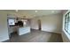Open floor plan featuring durable floors, a bright kitchen, and stainless appliances at 2333 22Nd S St, St Petersburg, FL 33712