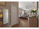 Comfortable main bedroom with natural light, ceiling fan, and en-suite bathroom access at 2350 Virgil Hall Rd, Lithia, FL 33547