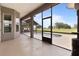 Expansive screened lanai overlooking the lawn, featuring an exposed beam pavilion and a swimming pool at 2350 Virgil Hall Rd, Lithia, FL 33547