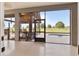 Enjoy the breeze in a screened lanai with pool views and rustic wood frame outdoor pavilion at 2350 Virgil Hall Rd, Lithia, FL 33547