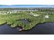 Secluded house surrounded by mangrove trees, canals, and a private pier at 2400 Miguel Bay Dr, Terra Ceia, FL 34250
