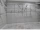 Walk-in closet with custom wire shelving for maximized organization at 2400 Miguel Bay Dr, Terra Ceia, FL 34250