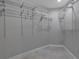 Walk-in closet equipped with wire shelving for optimal storage at 2400 Miguel Bay Dr, Terra Ceia, FL 34250