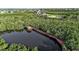 Beautiful wooden dock perfect for boaters and nature lovers at 2400 Miguel Bay Dr, Terra Ceia, FL 34250