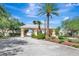 Picturesque gated community entrance with manicured landscaping and vibrant palm trees on a beautiful sunny day at 24512 Bramhope Ct, Punta Gorda, FL 33980