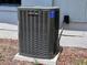 Close up shows the Trane XR AC unit in the backyard of the house at 2720 12Th Ave W, Bradenton, FL 34205