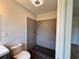 Bathroom features a tiled shower, and pebble floor at 2720 12Th Ave W, Bradenton, FL 34205