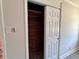 Closet with wooden shelves offering practical storage solutions at 2720 12Th Ave W, Bradenton, FL 34205