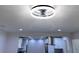 Close-up of modern ceiling fan featuring unique crystal accents and recessed lighting at 2720 12Th Ave W, Bradenton, FL 34205