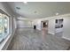 Bright and spacious living room boasting modern flooring and a cozy fireplace at 2720 12Th Ave W, Bradenton, FL 34205
