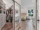 Bedroom features a built-in shelving and a desk, complete with a walk-in closet at 2816 Breton Woods, Sarasota, FL 34235