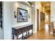 Hallway featuring tiled floors, recessed lighting, and a console table with decor at 2901 Little Country Rd, Parrish, FL 34219
