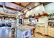 Gourmet kitchen features a large island, custom cabinetry, and high-end appliances at 2901 Little Country Rd, Parrish, FL 34219
