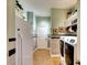 Laundry room with washer, dryer, and tile flooring at 2901 Little Country Rd, Parrish, FL 34219