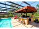 Pool with spa and outdoor bar at 2901 Little Country Rd, Parrish, FL 34219