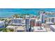 A beautiful high-angle view showing the building, the bay, and the bridge in the distance at 33 S Palm Ave # 1101, Sarasota, FL 34236