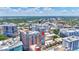 A high-angle aerial view shows the building's location relative to the city and its surroundings at 33 S Palm Ave # 1101, Sarasota, FL 34236
