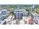 High aerial view of the building, highlighting its modern architecture and rooftop amenities at 33 S Palm Ave # 1101, Sarasota, FL 34236