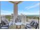 Relaxing outdoor balcony featuring comfortable seating and a stunning view of the city and water at 33 S Palm Ave # 1101, Sarasota, FL 34236