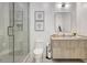 Modern bathroom showcasing a sleek vanity, a toilet, shower with glass door, and stylish fixtures at 33 S Palm Ave # 1101, Sarasota, FL 34236