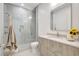 Spa-like bathroom features a glass-enclosed shower, modern vanity, and stylish decor at 33 S Palm Ave # 1101, Sarasota, FL 34236