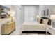 Tastefully designed bedroom shows contemporary décor, marble floors, and ample natural light at 33 S Palm Ave # 1101, Sarasota, FL 34236