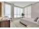 Bright bedroom with lots of light and large windows with bright white shades at 33 S Palm Ave # 1101, Sarasota, FL 34236