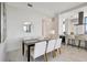 Bright dining area adjacent to the modern kitchen has seating for six at 33 S Palm Ave # 1101, Sarasota, FL 34236