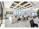 Expansive living room features large windows and a beautifully designed coffered ceiling at 33 S Palm Ave # 1101, Sarasota, FL 34236