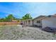Spacious backyard featuring a brick patio, grill, sandbox, and plenty of room for Gathering fun and entertaining at 3417 49Th W St, Bradenton, FL 34209