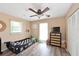 Stylish bedroom with a car-themed bed, modern dresser, and natural light from the windows at 3417 49Th W St, Bradenton, FL 34209