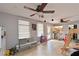 Bright playroom featuring tiled floors, ceiling fans and lots of space to play at 3417 49Th W St, Bradenton, FL 34209