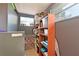 Functional storage area with shelving, file cabinet, and a window providing natural light at 3417 49Th W St, Bradenton, FL 34209