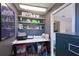 Well-organized storage space with shelves and workspace featuring ample shelving for supplies at 3417 49Th W St, Bradenton, FL 34209
