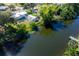 Property aerial featuring a canal view and community at 3585 Brooklyn Ave, Port Charlotte, FL 33952