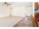 Open living space with two floor types, seamlessly blending a living area and kitchen views at 3585 Brooklyn Ave, Port Charlotte, FL 33952