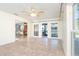 A well lit sun room with a view of the pool at 3585 Brooklyn Ave, Port Charlotte, FL 33952