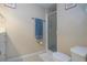 Bathroom with walk-in shower and vanity with white cabinets at 3745 Almeria Ave # 7S, Sarasota, FL 34239